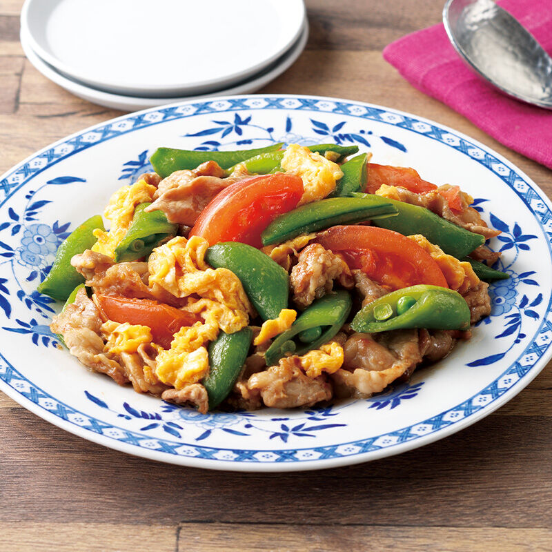 スナップエンドウとトマトの中華風卵炒め